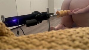 Deep Stretch Ride on a Machine-Mounted Silicone Dildo