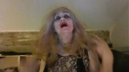 Sarah Millward Dominates in Cross-Dressing BDSM Play