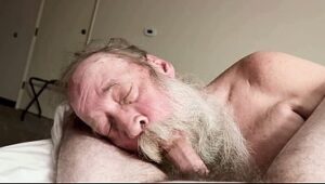 Bearded Daddy Delivers A Rough Blowjob to Hairy Cub