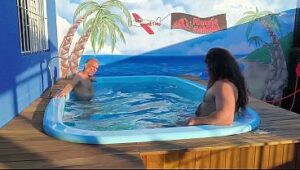 Poolside kiss between Carmona’s dad and his friend